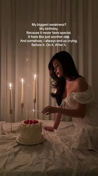 Birthday Sad Shayari showing a woman holding a candle during a lonely birthday moment