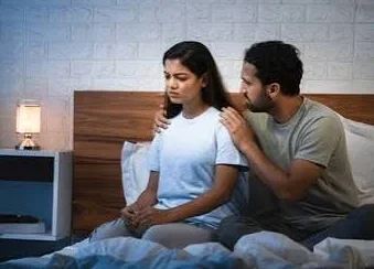 Husband Wife Sad Shayari showing an Indian husband and wife experiencing emotional tension at home